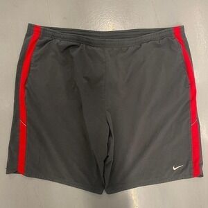Nike drifit basketball athletic shorts with red sidestripe